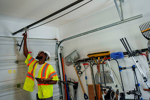 Professional Garage Door Panel Replacement technician working in Auburn, ME